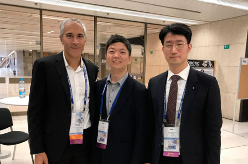 Dr. Jeffrey Epstein, Miami board-certified facial plastic surgeon, with colleagues at a hair restoration conference