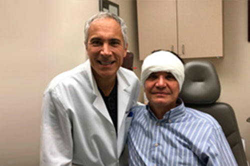 Dr. Jeffrey Epstein, Miami board-certified facial plastic surgeon, with a hair restoration patient after treatment